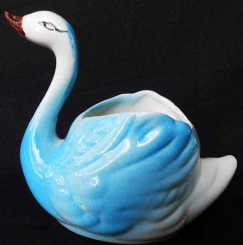 small decorative handpainted blue swan