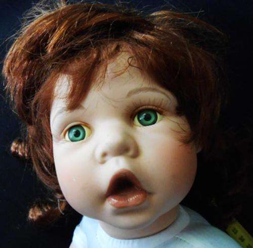 Porcelain Baby Doll   Collectable,numbered and marked 45 cm