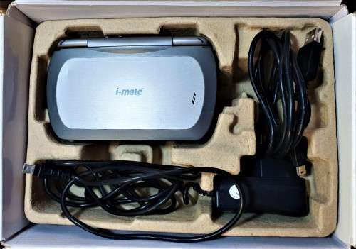 I Mate cell phone. In box. Working. From the mid 2000`s