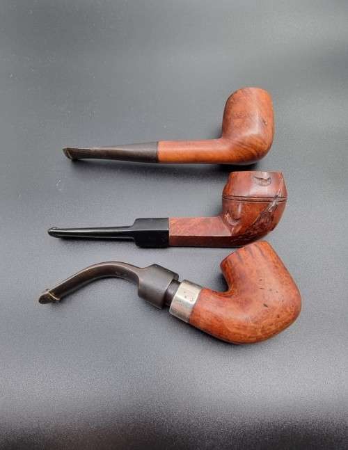 3 Wooden Smoking Pipes. One with Silver collar.