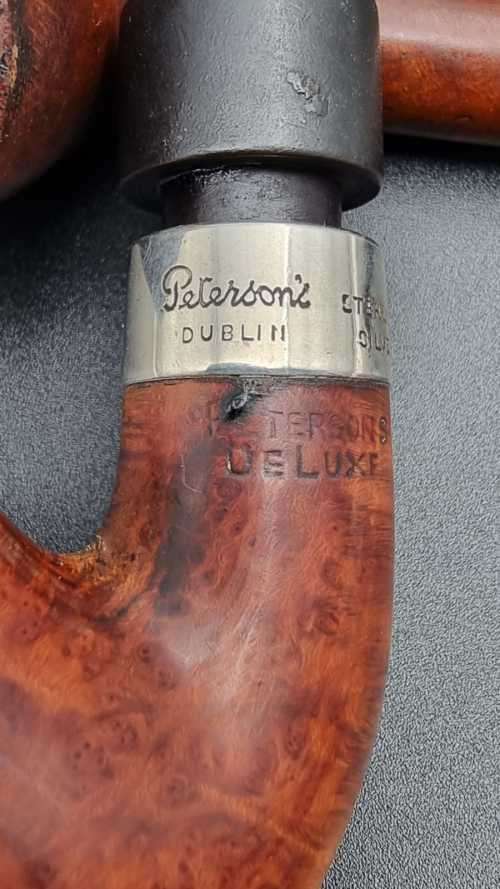 3 Wooden Smoking Pipes. One with Silver collar.