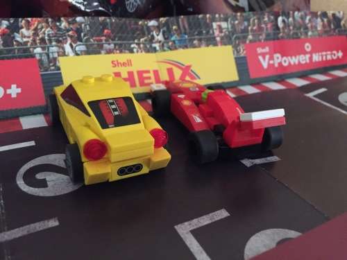 LEGO SHELL FERRARI lot of 5 - 2 cars loose and 3 mint in sealed bags with promo start track leaflet.