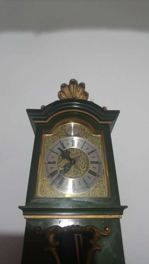 small grandfather clock pendulum