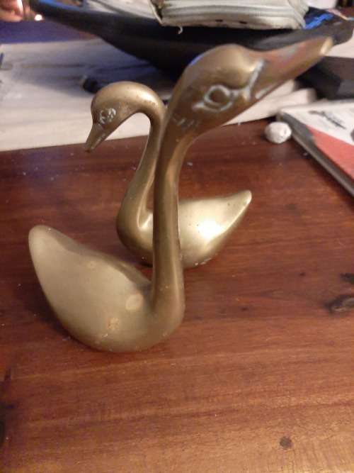 Brass swans