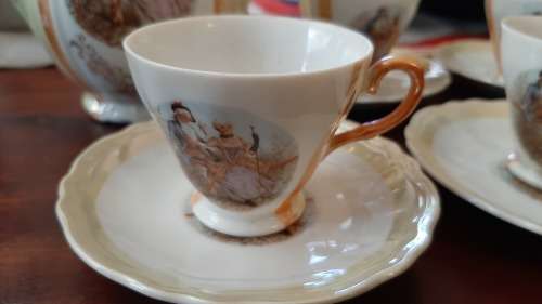 Tea set 6 cups and saucers and teapot