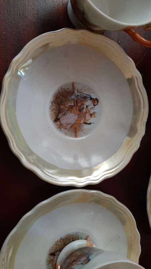 Tea set 6 cups and saucers and teapot