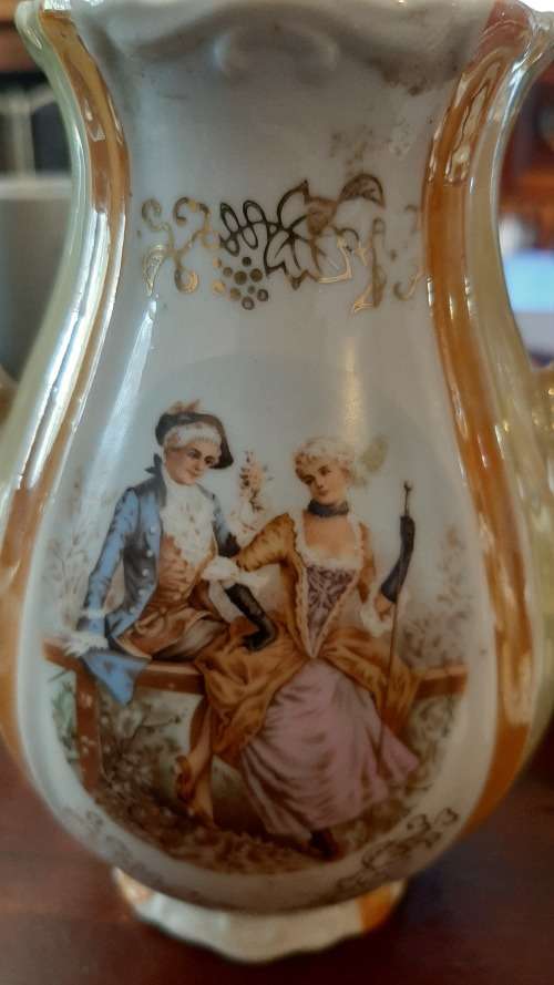 Tea set 6 cups and saucers and teapot