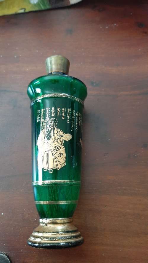 Green perfume bottle