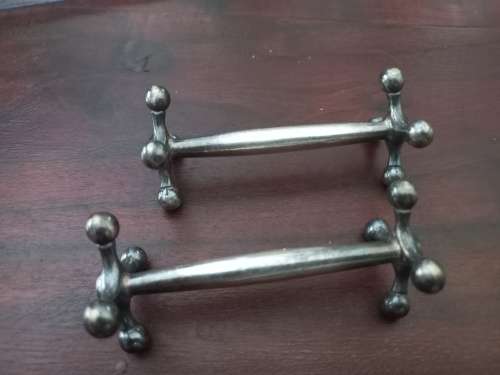 Pewter spoon and knife rests