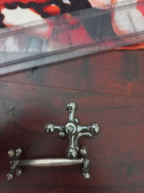 Pewter spoon and knife rests