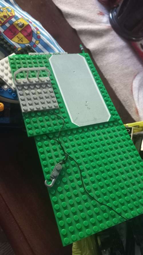 Lego sets boat and police station