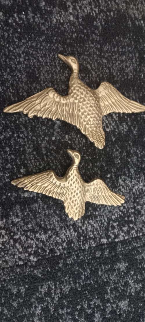 Copper flying ducks