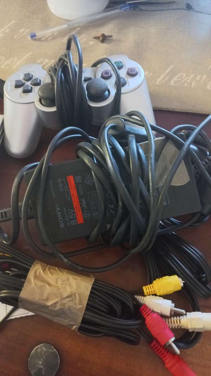 PS2 console with 8 games and 8mb card