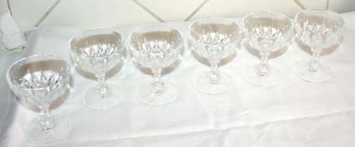 A COLLECTION OF SIX MAGNIFICENT VINTAGE/ANTIQUE PUDING GLASES ON A HIGH STEM VERY STYLISH