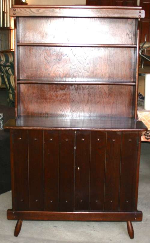 A AMAZING DARK WOOD WELSH DRESSER WITH BEAUTIFUL DETAIL AND ONE DRAWER INSIDE THE CUPBOARD