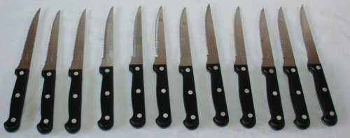 A MAGNIFICENT COLLECTION OF 12 HILLHOUSE STAINLESS STEEL STEAK KNIFES