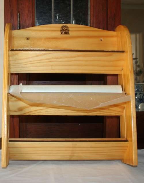 A MUCH HAVE!!! A SOLLID WOOD FOIL, GLAD WRAP & SANDWICH PAPER DISPENS BY THE HOUSE OF YORK!