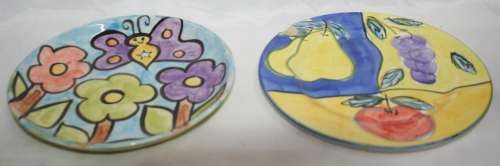 TWO BEAUTIFUL DECORATIVE GLASED PLATES