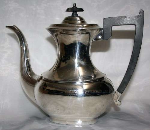 A MARVELOUS - Sheffield teapot with bakelite handle and that really speaks to the art deco style!!!!
