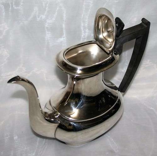 A MARVELOUS - Sheffield teapot with bakelite handle and that really speaks to the art deco style!!!!