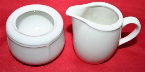 A STUNNING CRISP WHITE CONTINENTAL SUPRADURA MILK CREAMER & SUGAR BOWL