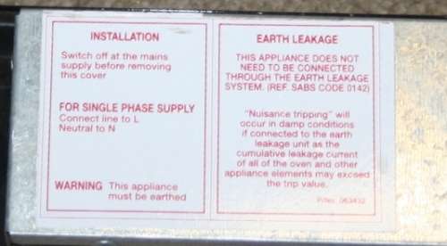 A BLACK DEFY SLIMLINE FOUR PLATE HOB RELATIVELY NEW - IN GOOD CONDITION