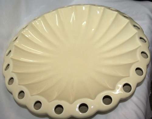 ABSOLUTLEY GORGEOUS LARGE SALAD BOWLS WITH WHOLES TO PUT WATER IN AND FLOWERS ALL AROUND