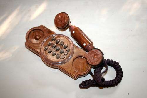 A GORGEOUS ANTIQUE LOOKING SYNTHETIC TELEPHONE IN WORKING CONDITION