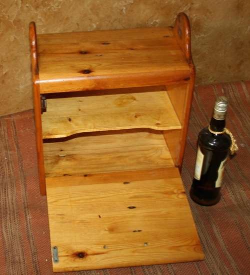 A FANTASTIC SOLLID WOOD SPICE CUPBOARD WITH A DOOR DEEP ENOUGH TO SERVE AS A CD RACK OR SIDE TABLE