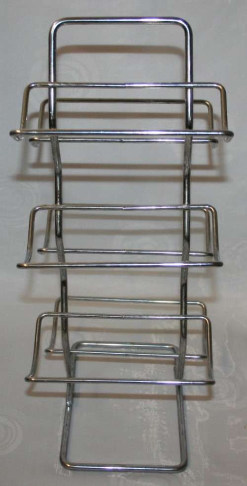 Here is a great, vintage, 5 bottle wine rack made out of Stainless steel. Stunning
