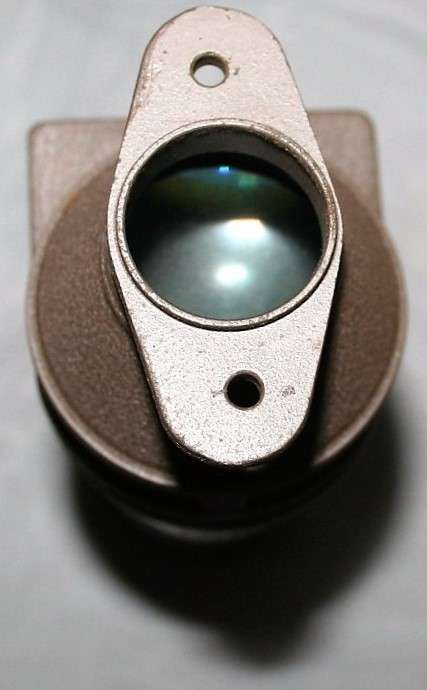 A vintage attachment FOR a 8'mm' PROJECTOR SLIDE ATTACHMENT