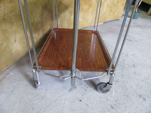 A marvelous Dinette vintage trolley table is one of the most practical serving tables,