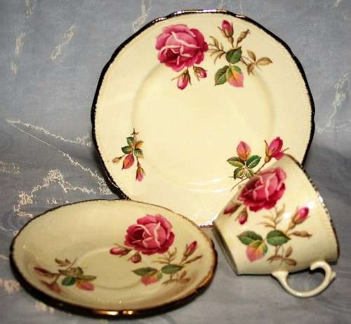 A Spectacular Royal Swan Trio Set. Beautiful creamy yellow background with gold roped edge around!