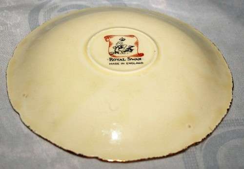 A Spectacular Royal Swan Trio Set. Beautiful creamy yellow background with gold roped edge around!