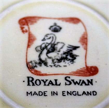 A Spectacular Royal Swan Trio Set. Beautiful creamy yellow background with gold roped edge around!