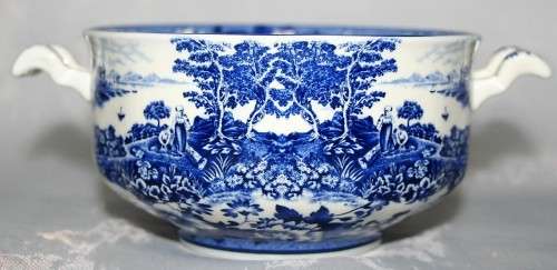 This is a William James English Porcelain Soup Bowls. The blue and white colors are of two people