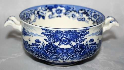 This is a William James English Porcelain Soup Bowls. The blue and white colors are of two people