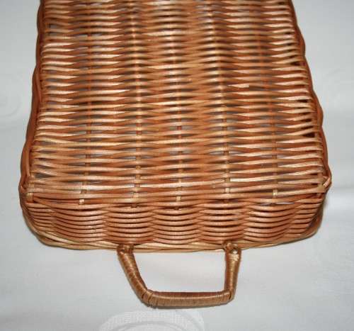 Beautiful medium size hand woven grass basket with handles each side.