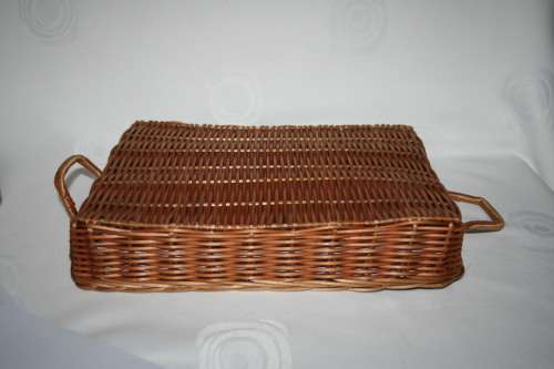 Beautiful medium size hand woven grass basket with handles each side.