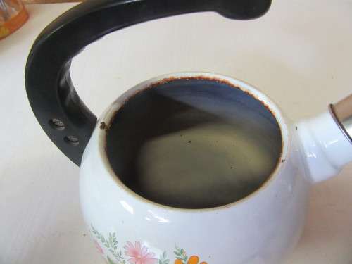 A Retro Floral Design Kettle this Enamelware Vintage Kettle is perfect for a vintage kitchen.