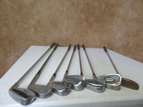 SEVEN GOLF CLUBS FOR BAR DECOR OR FOR THE KIDS TO PLAY WITH BID PER EACH