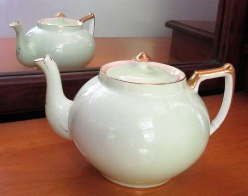 This lovely mid-century Tea Pot were made in England by Bell   China. A Beautiful Light Pastel Green
