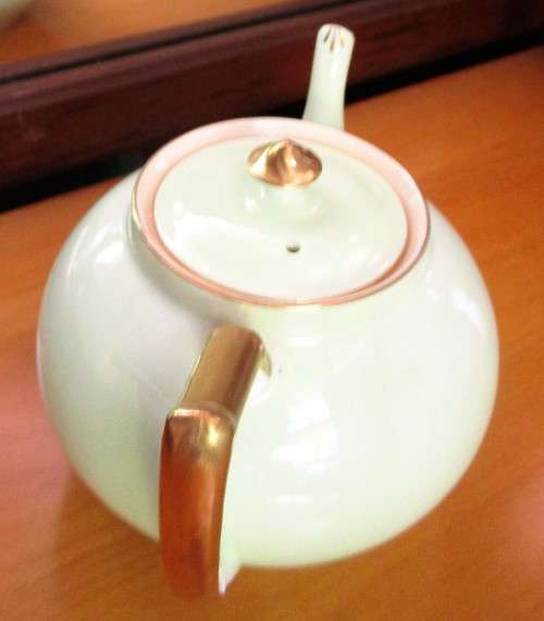 This lovely mid-century Tea Pot were made in England by Bell   China. A Beautiful Light Pastel Green