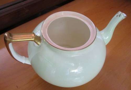 This lovely mid-century Tea Pot were made in England by Bell   China. A Beautiful Light Pastel Green