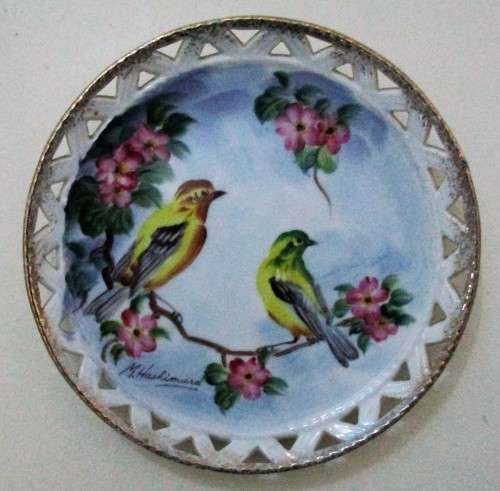 This hand painted plate features beautiful Birds painted in stunning colors signed Hashimura