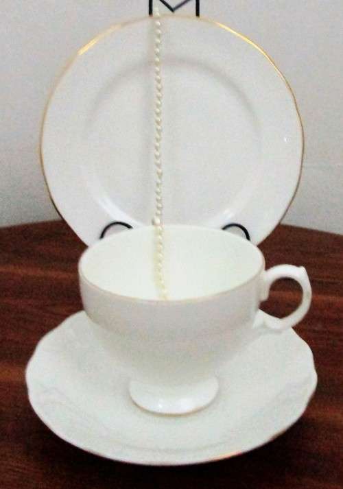 A Stylish Vintage Queen Anne England Trio Set in a Crisp White with a lush Gold Trim