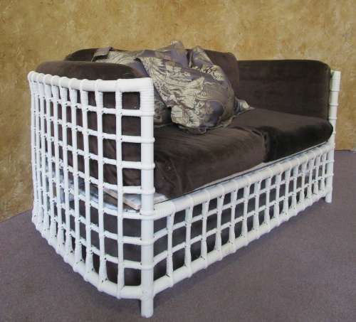 A AWESOME VINTAGE DOUBLE SEATER CANE COUCH FINISHED IN A ROYAL IVORY CHALK PAINT