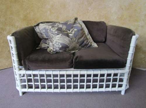A AWESOME VINTAGE DOUBLE SEATER CANE COUCH FINISHED IN A ROYAL IVORY CHALK PAINT