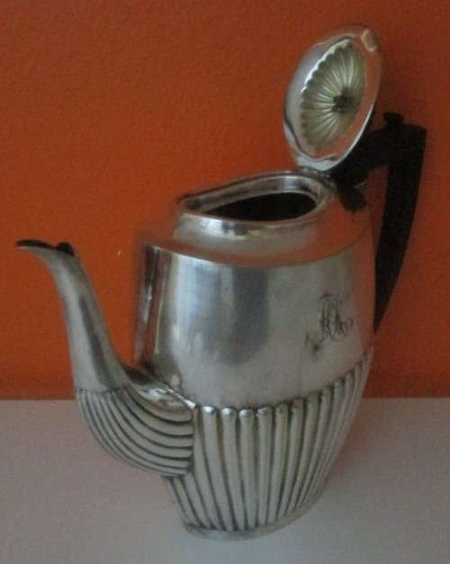 A MARVELOUS - Sheffield Style teapot with bakelite handle and finial that really speaks ART DECO