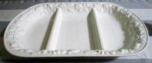 A STUNNING CRISP WHITE SERVING PLATER WITH MARVELOUS RAISED DECORATIVE EDGING